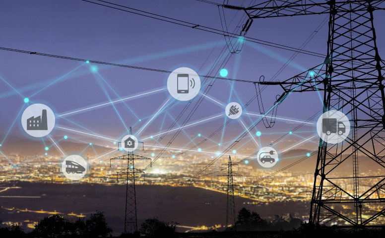 Un panorama notturno di un servizio elettrico con bolle IoT.